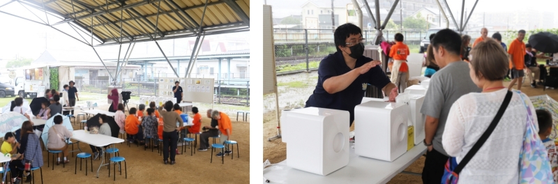 志布志市サステナブルマルシェで市民の方に職員から生ゴミ乾燥機を紹介